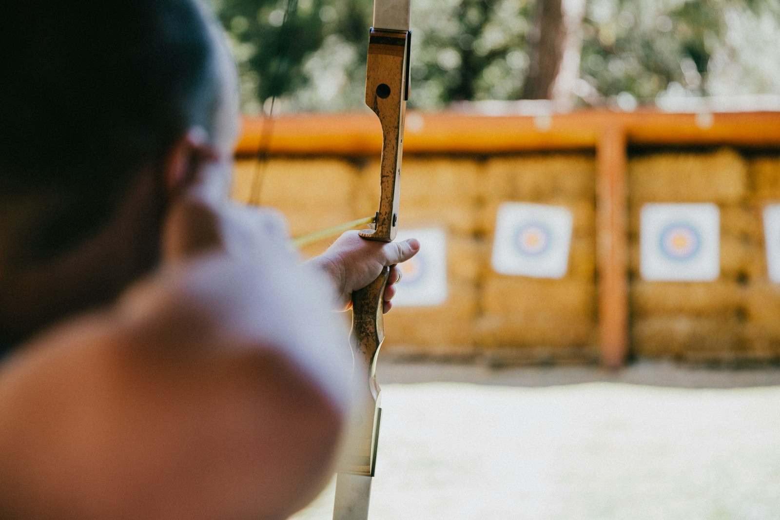 Photo by Vince Fleming person holding arrow